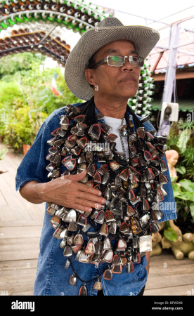 thai-man-with-hundreds-amulets-around-his-neck-nonthaburithailand-BFWDX8.jpg